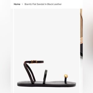 Biarritz Flat Sandal in Black Leather with Gold Accent